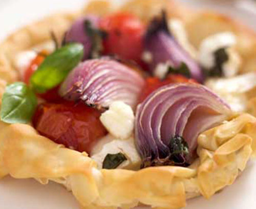 Filo Tartlets with Roasted Onions, Tomatoes and Goats Cheese