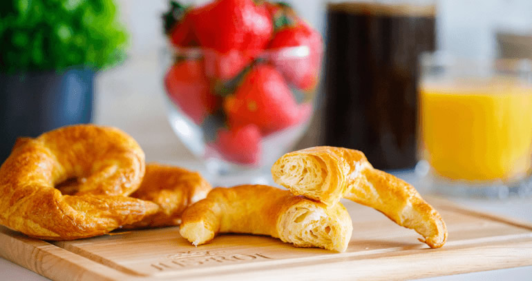 Croissants on a wooden board