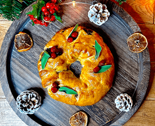Christmas Pastry Wreath served on wooden plate